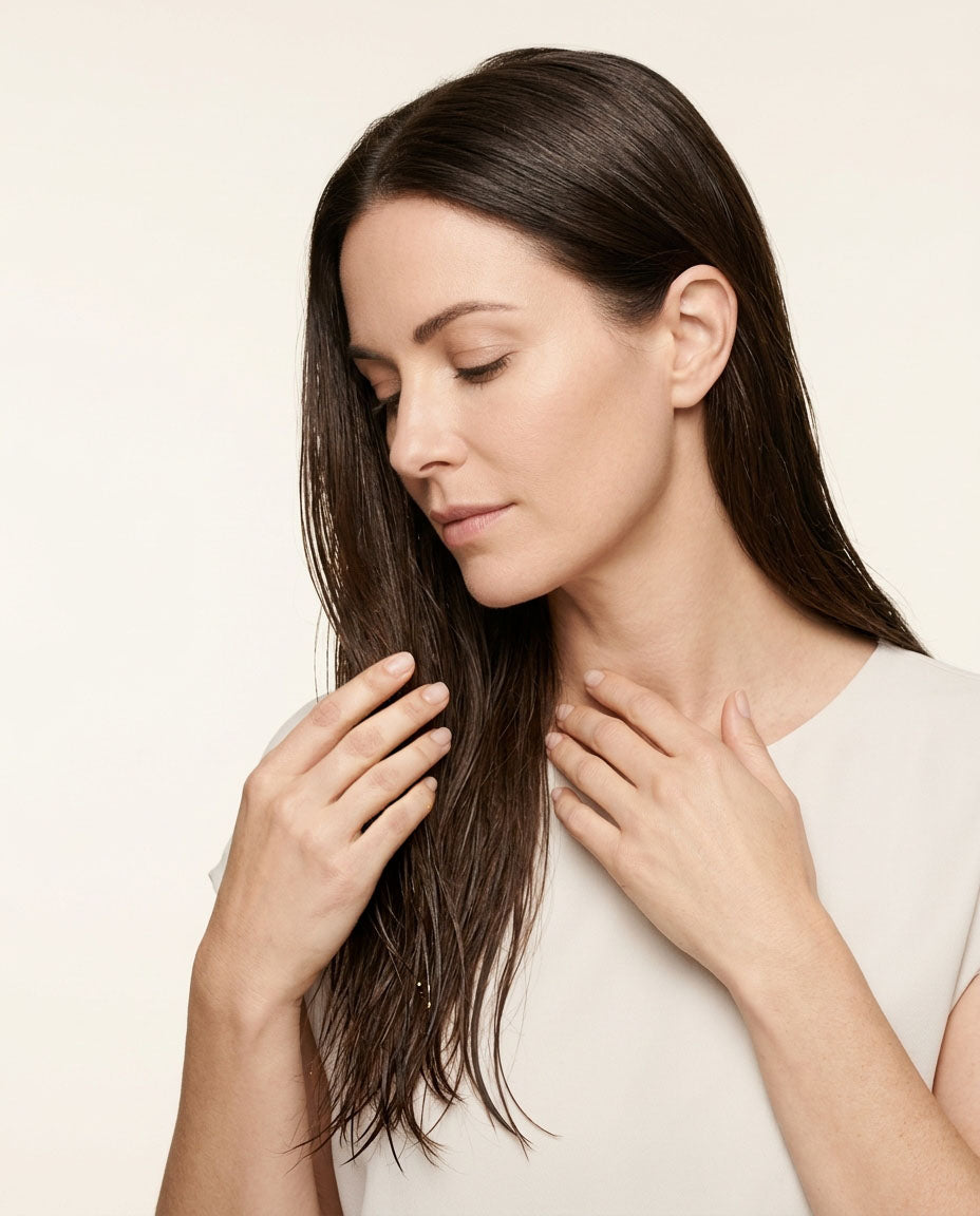 Cold-pressed castor oil worked through the mid-lengths and ends of dry hair