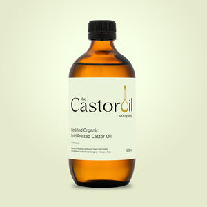Certified organic cold-pressed castor oil in a 500ml amber glass bottle with no pump, screw cap only